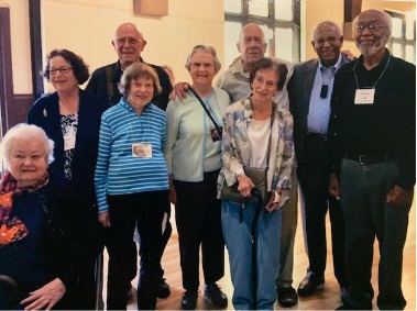 Our treasured Over 80 and Over 90 year olds in 2017. Nine older adults in the Parish Hall, one seated and eight standing.