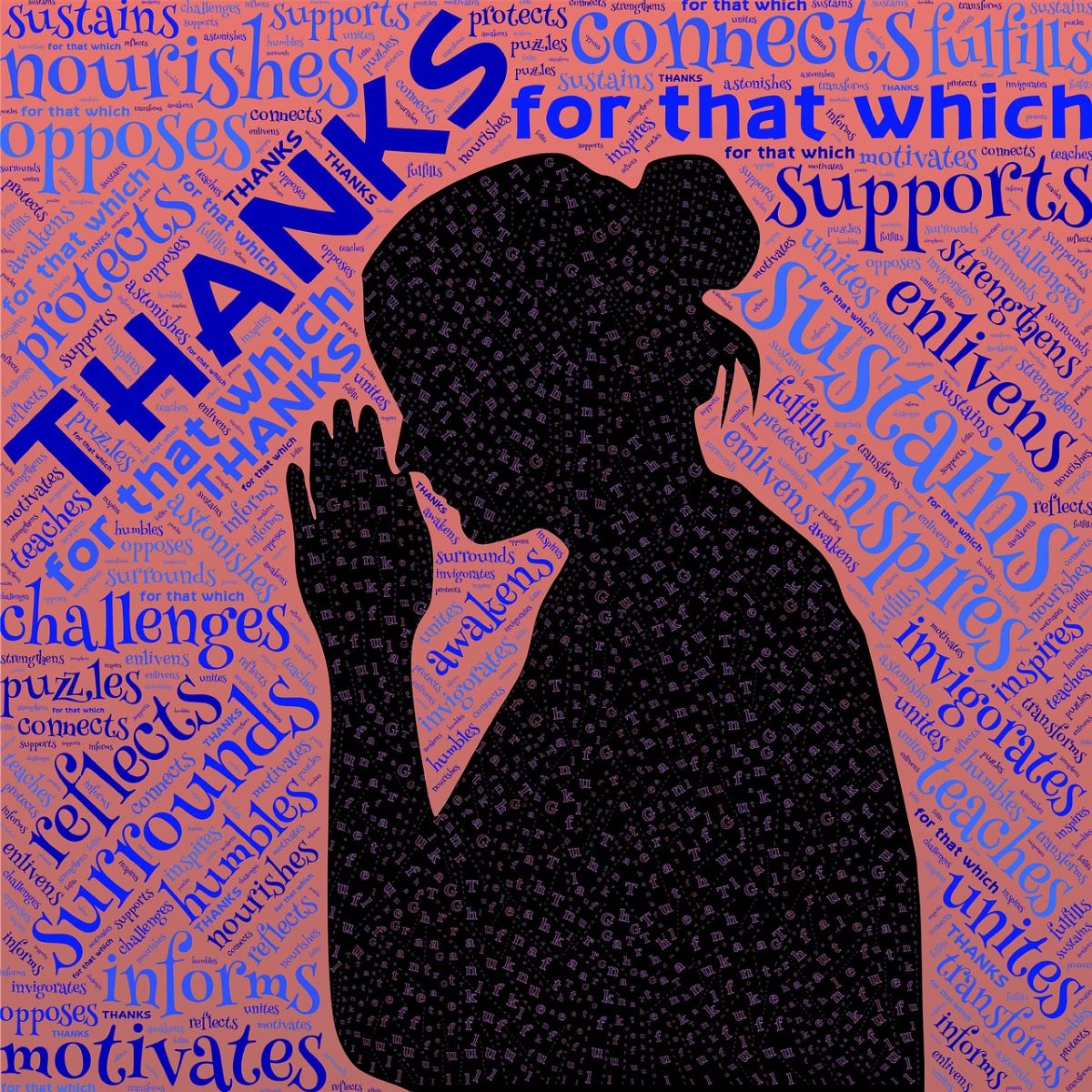 Silhouette of a woman with a bun praying against a pink background with words surrounding her such as, 